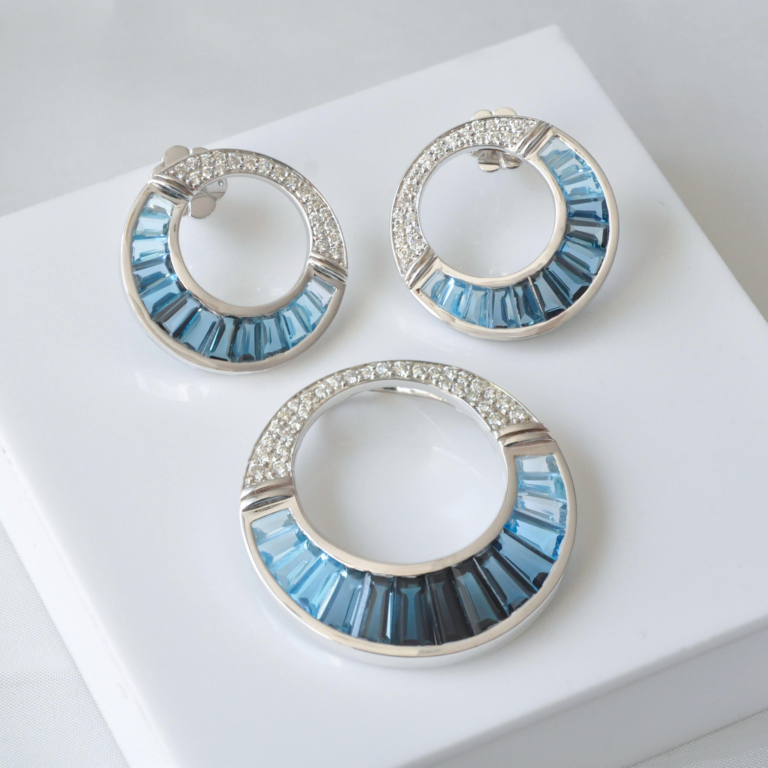 Experience the perfect craftsmanship and color with this exquisite 14K gold earring and pendant set, meticulously hand-crafted to highlight the serene beauty of calibre-cut blue topaz baguette gemstones.

Each piece in this set features a