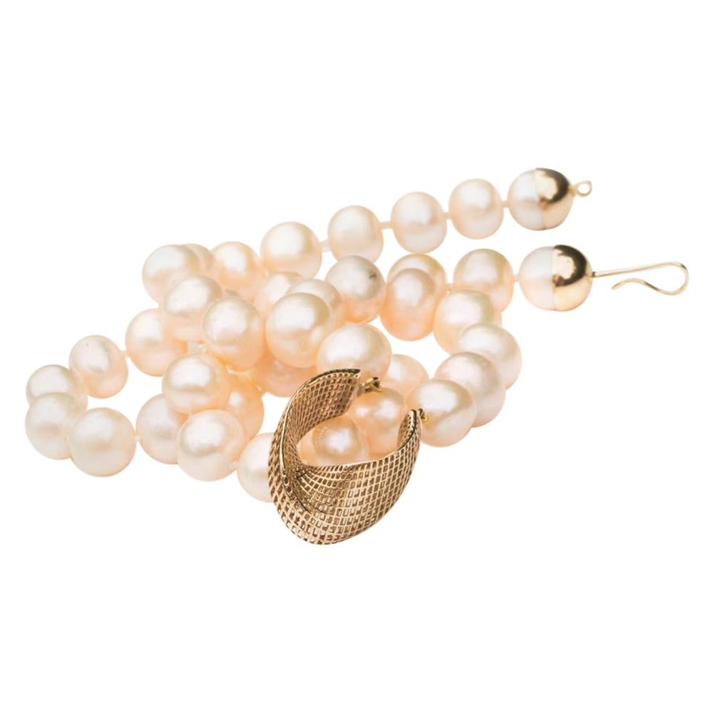 14 Karat Gold Cream Freshwater Pearls, Net Mobius Center Piece For Sale