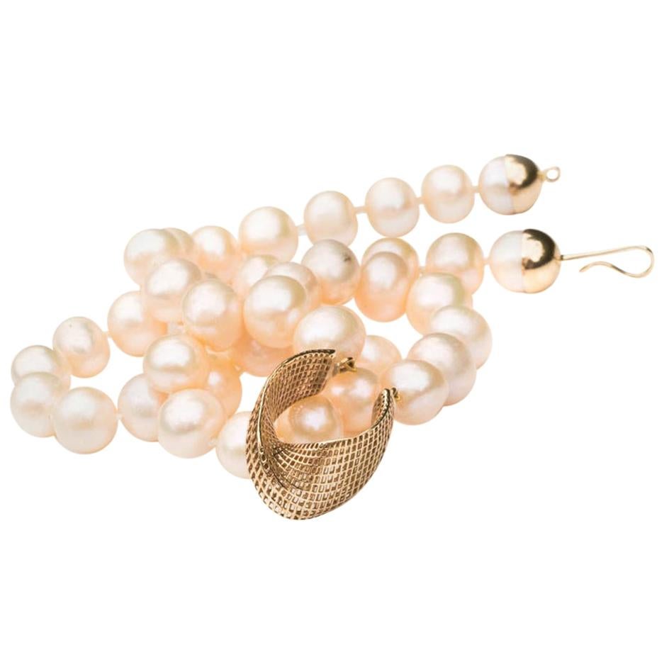 14 Karat Gold Cream Freshwater Pearls, Net Mobius Center Piece For Sale