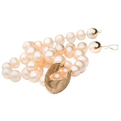 14 Karat Gold Cream Freshwater Pearls, Net Mobius Center Piece
