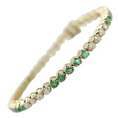 14 Karat Gold Custom Made Bracelet with Very Clean Emeralds and Round Diamonds