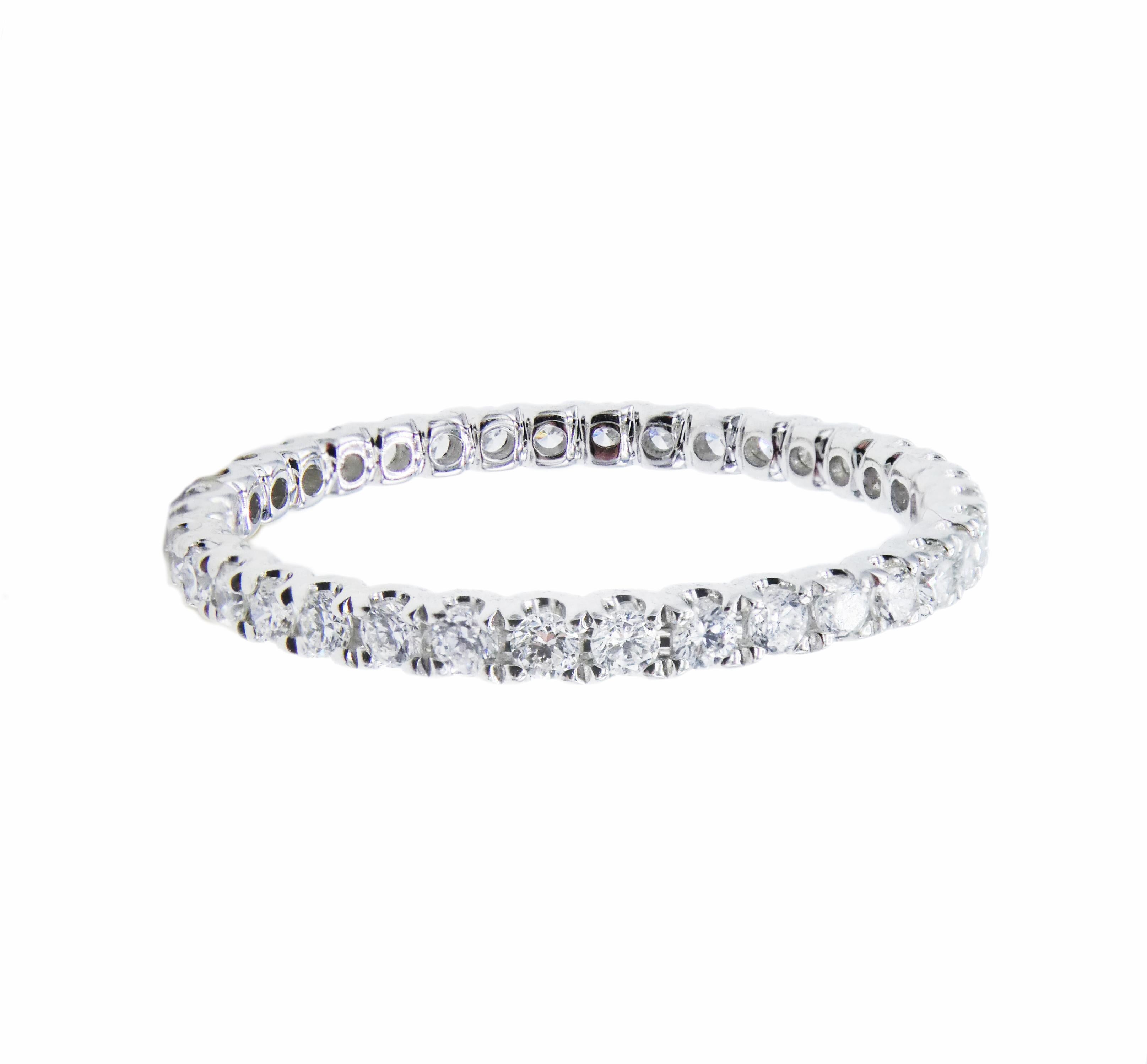 14k White Gold Natural Diamond 0.45 CTW Thin Eternity Wedding Band Round Natural Diamonds Ring Size 6

Metal: 14k White Gold
Diamonds: 36 round brilliant cut natural diamonds approx. 0.44 ctw G-H VS. 
Weight: 0.77 grams
Size: 6
Markings: Stamped