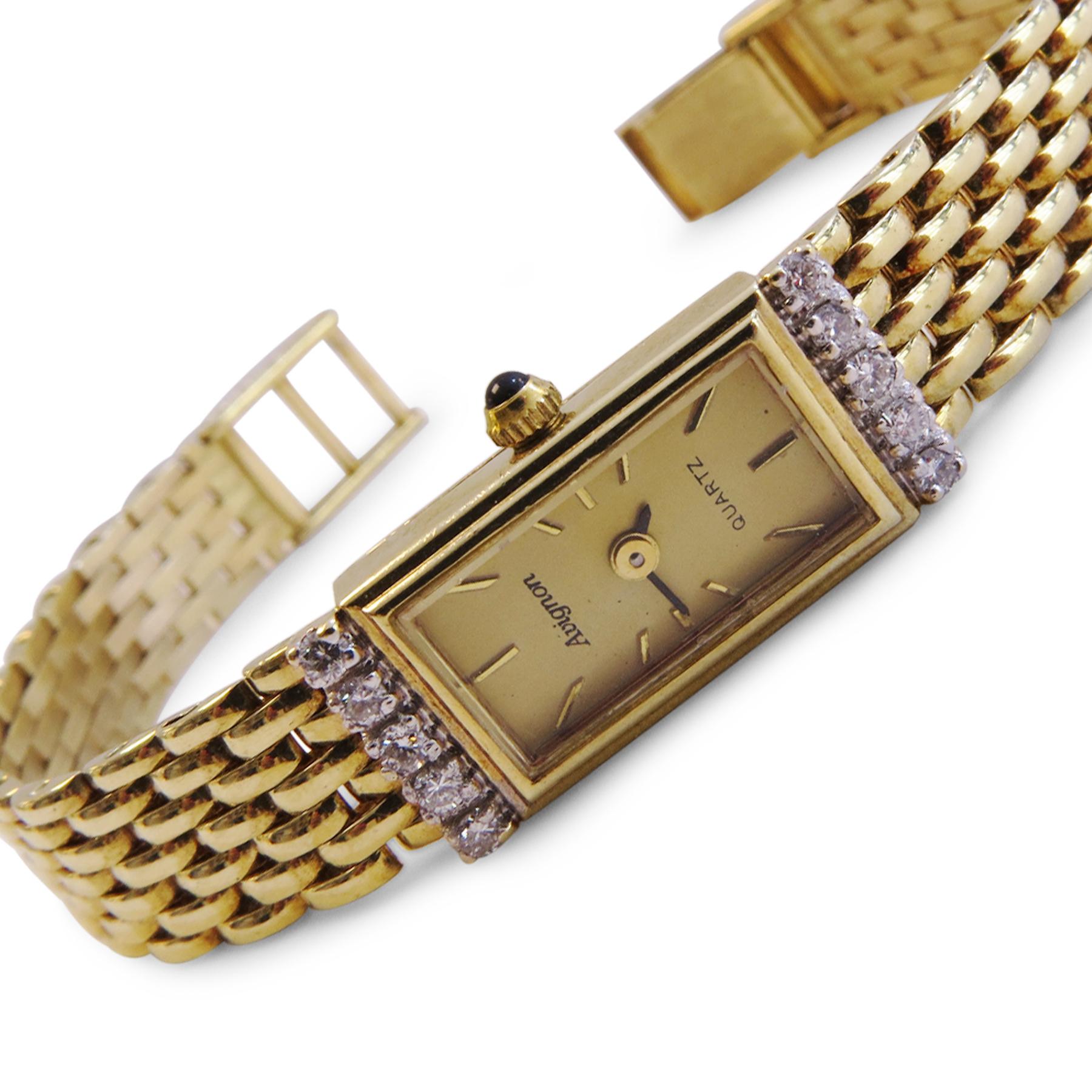 Avignon Brand 
14k Yellow Gold 
Size= 7 inches 
Weigh= 23gr 
Diamond= 0.30ct total 
Dial= 12mm x 23mm 
Bands= 10mm