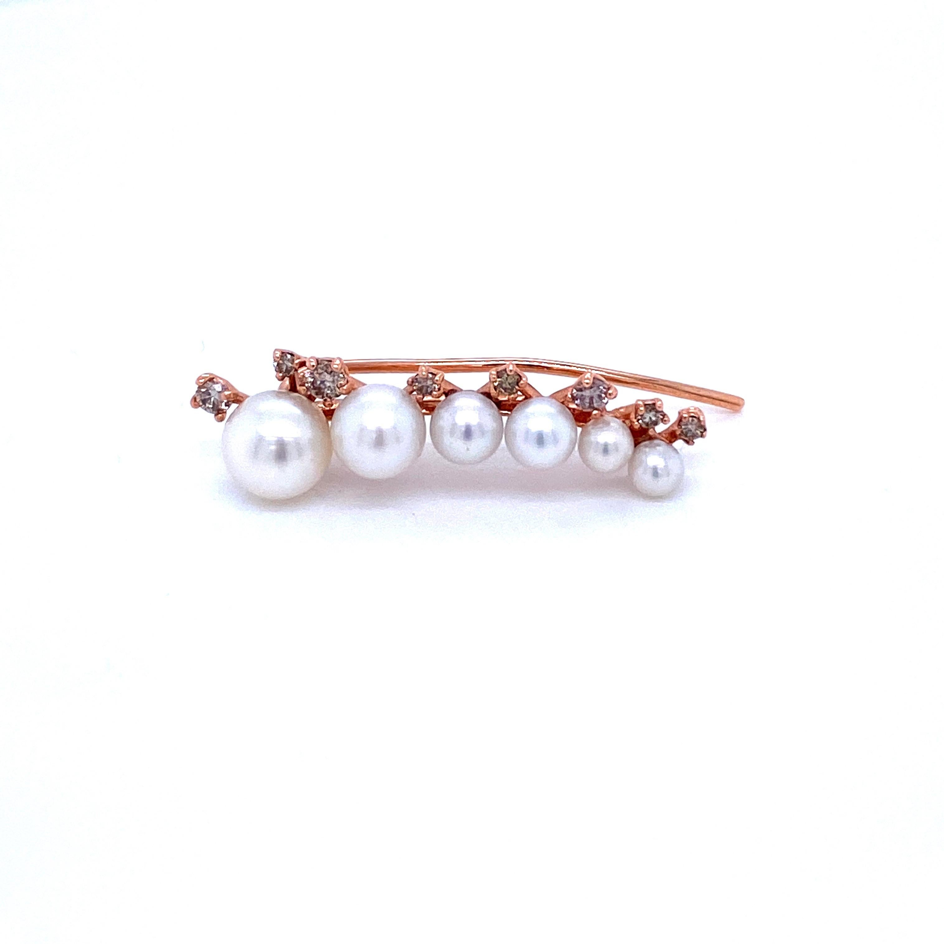 This unusual 14k rose gold erring is set with freshwater pearls and adorned by 0.10 carats of shimmering round cut diamonds. Wear yours day or night, drop or ear way.
Earring sold single, also sold in pairs, contact us for information

CONDITION: