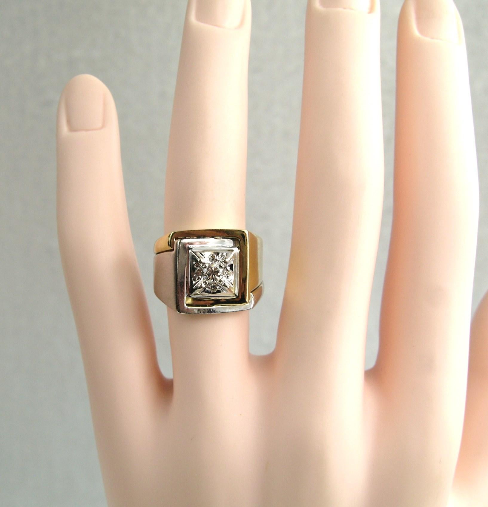 Stunning Mid-Century 14K White & Yellow Gold Diamond Ring. 4 Accent diamonds with a center diamond measuring approximately .25 carats total. SI1, H/I color. The Ring is a size 6.5 and can be sized by us or your jeweler. It can be worn by both women