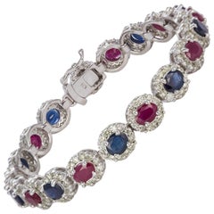 14 Karat Gold Diamond, Ruby and Sapphire Bracelet