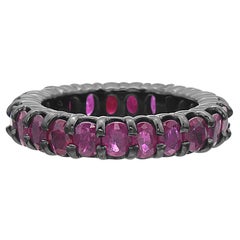 14 Karat Gold Dipped in Black Rhodium Ruby Eternity Band Ring