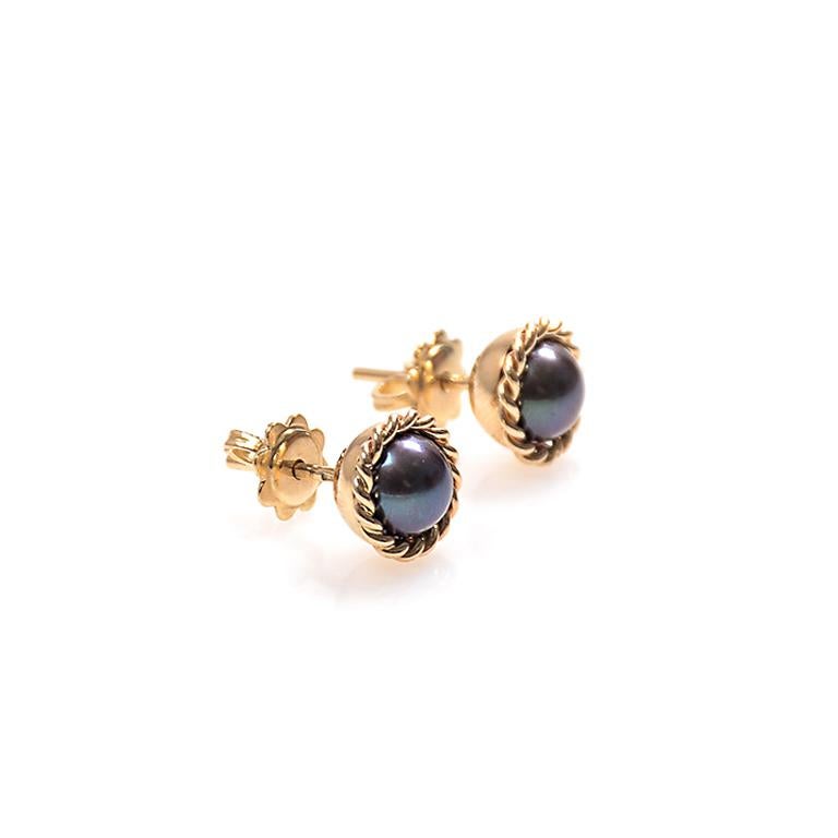 If you have never owned a piece of black pearl jewelry, you are in for a treat. Black pearls are redefining beauty, creating a stunning yet sophisticated addition to any jewelry collection.

These 14-Karat Gold earrings with black pearls are an