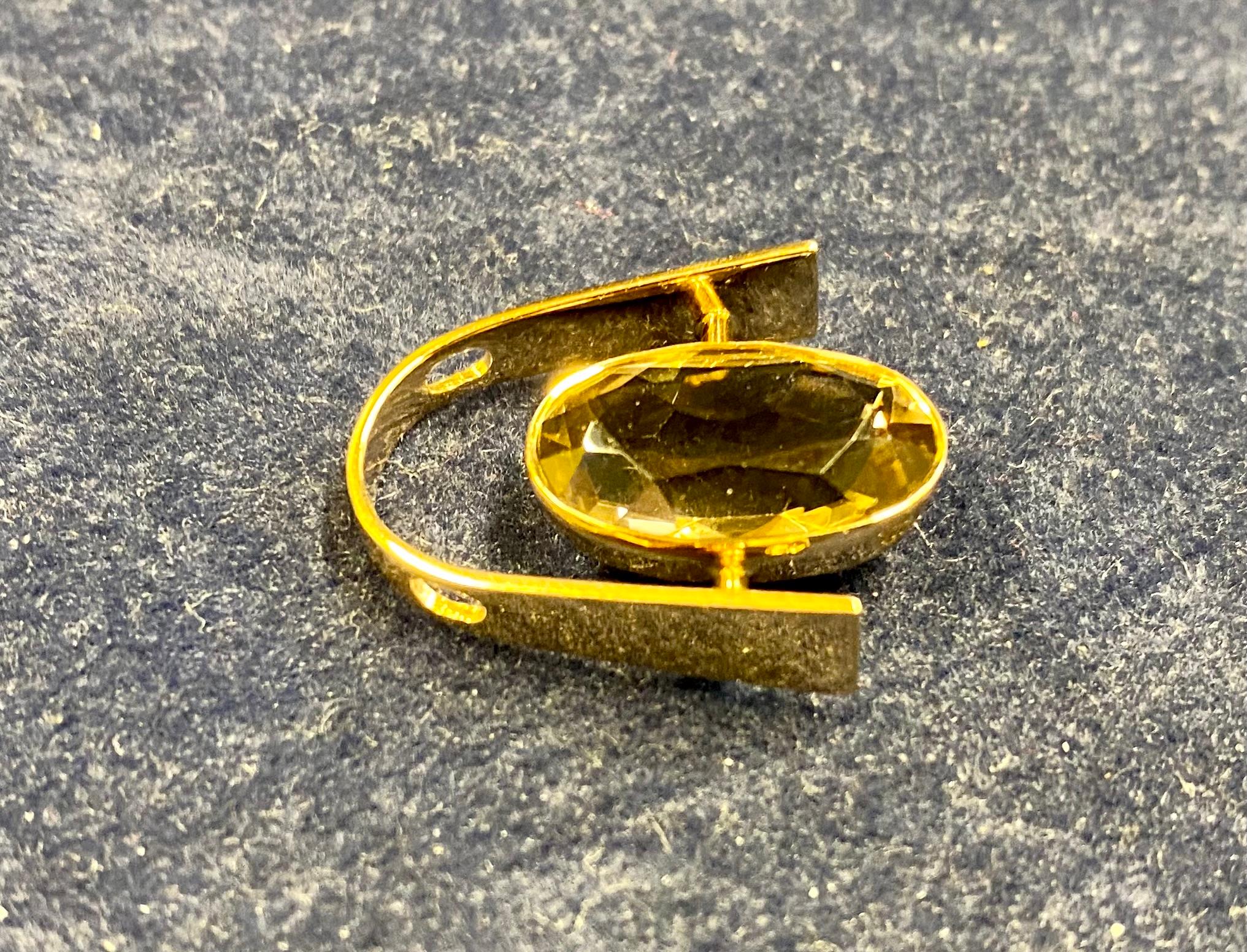 14 Karat Gold Eero Rislakki Stein-Halskette Made in Finland

585 Gold, Maker NW, Helsinki Eino Westerback.
Der Schmuck ist in sehr gutem Zustand.
Ein sehr seltener Fund.

Länge 2,5cm*2cm Gewicht 4g
Der Schmuck wird ohne Kette verkauft

Ich habe