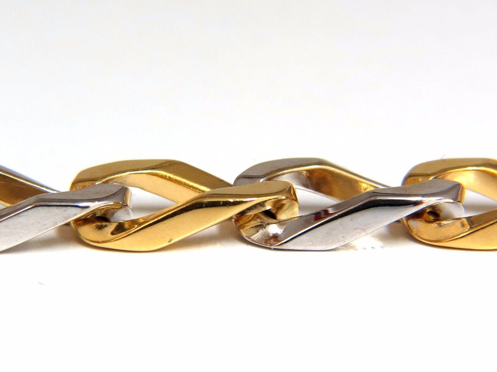 Elongated Curb Link

Unisex Bracelet

Smooth & High Shine

Two Toned

7.5 inch / wearable length

21.3 Grams.

6.6mm wide links

14kt Yellow Gold.

Secure & Comfortable clasp