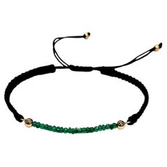 Bracciale unisex regolabile in oro 14 carati con smeraldo, Corde nere, lusso accessibile