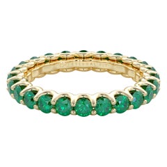 14 Karat Gold Emerald Eternal Fit Eternity Band Features 2.53 Carat of Green