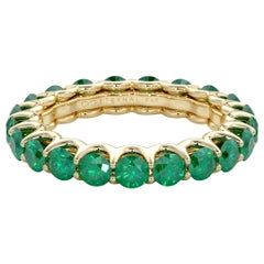 14 Karat Gold Emerald Eternal Fit Eternity Band Features 3.10 Carat of Green