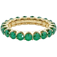 14 Karat Gold Emerald Eternal Fit Eternity Band Features 3.41 Carat of Green