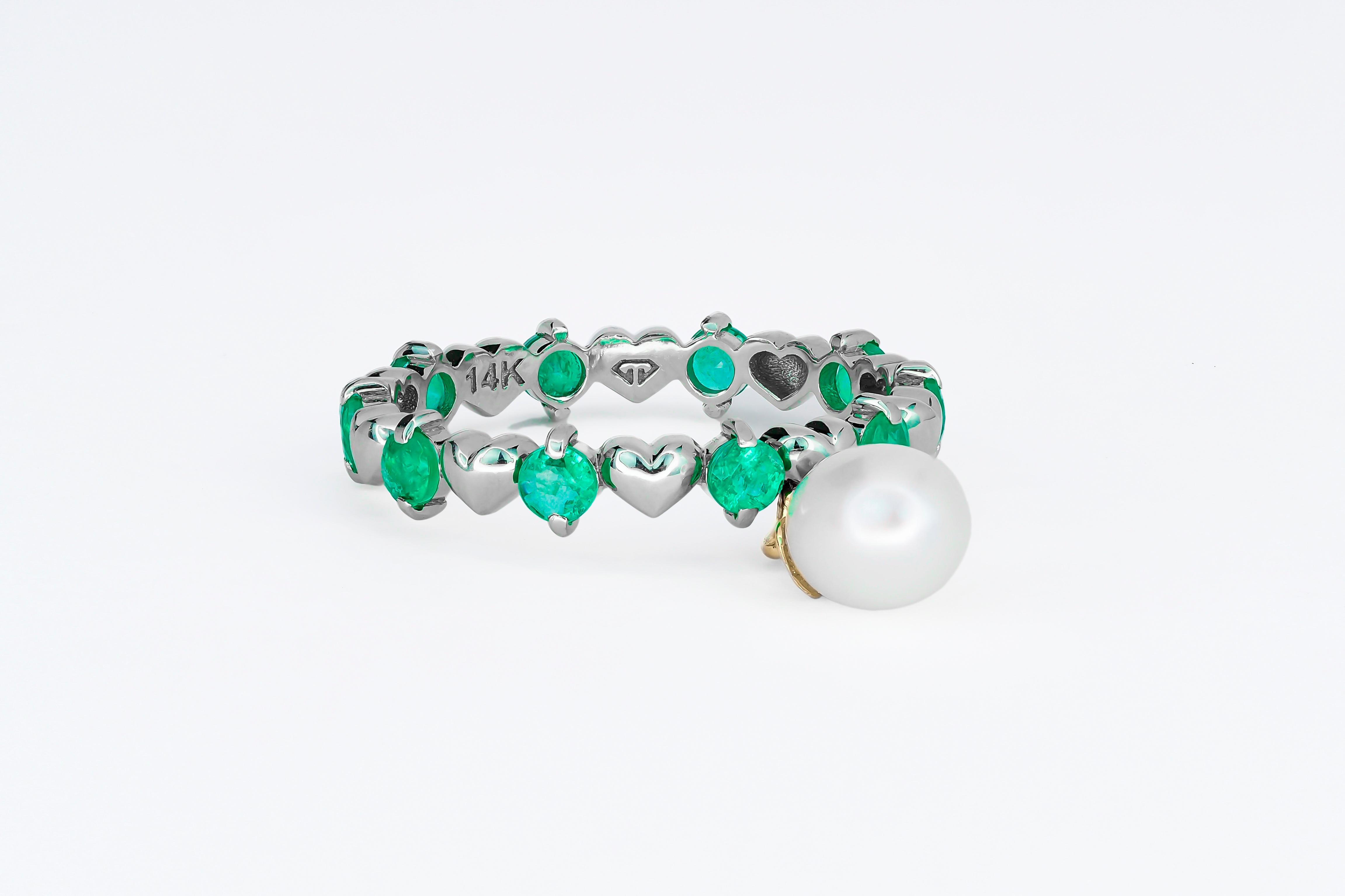 Modern 14 Karat Gold Eternity Ring with Emeralds and Pearl. Emerald Eternity Ring