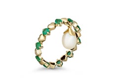 14 Karat Gold Eternity Ring with Emeralds and Pearl. Emerald eternity ring