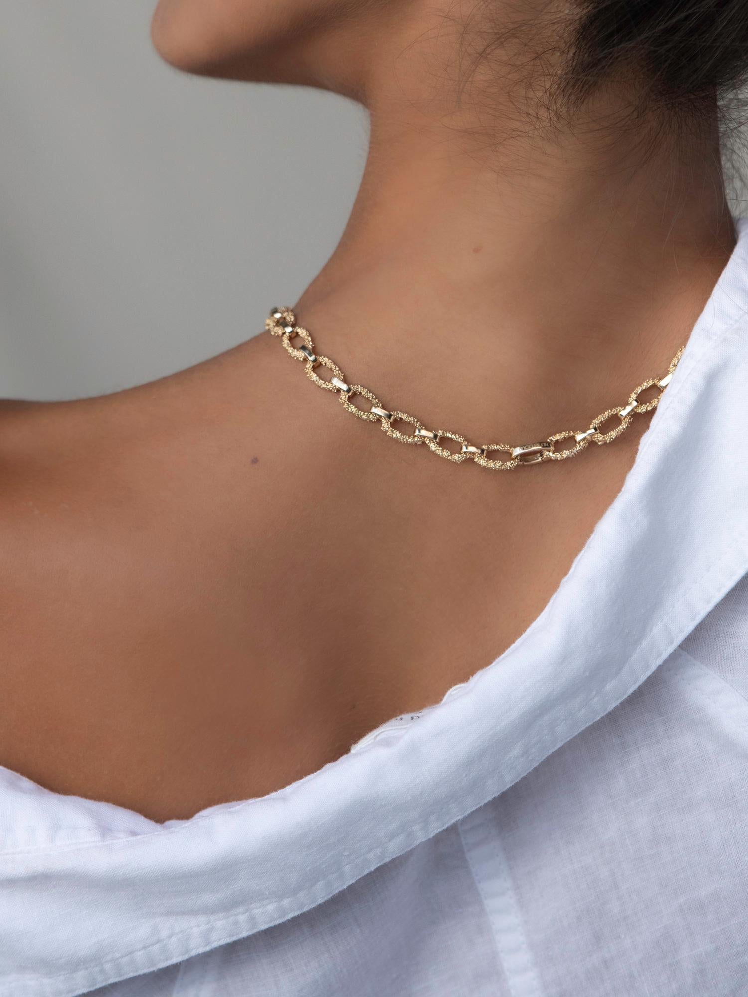 Inspired by the 5,000-year-old technique of granulation and the sandy shores of the greek isles, this handcrafted chain link necklace is as unique as it is stunning. With a seamless oval spring clasp for comfortable and secure fastening you‘ll