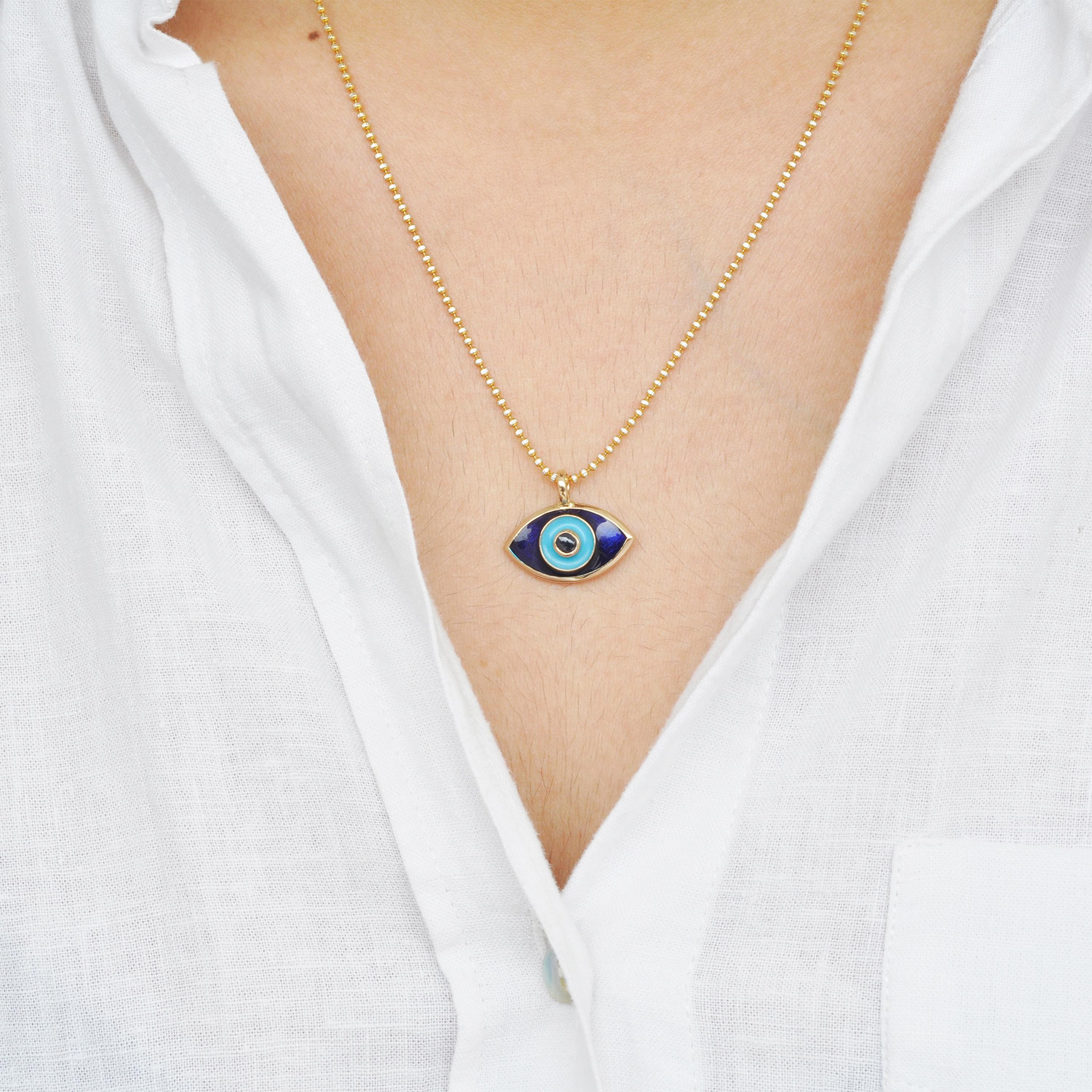 14 karat gold evil eye blue enamel turquoise enamel blue sapphire pendant necklace.

In these difficult and trying times, we would like to send all of you positive vibes and wish for protection from evil things that surround us right now. As legends