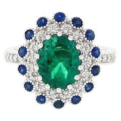 14 Karat Gold GIA 2.02 Carat Oval Colombian Emerald with Sapphire & Diamond Ring
