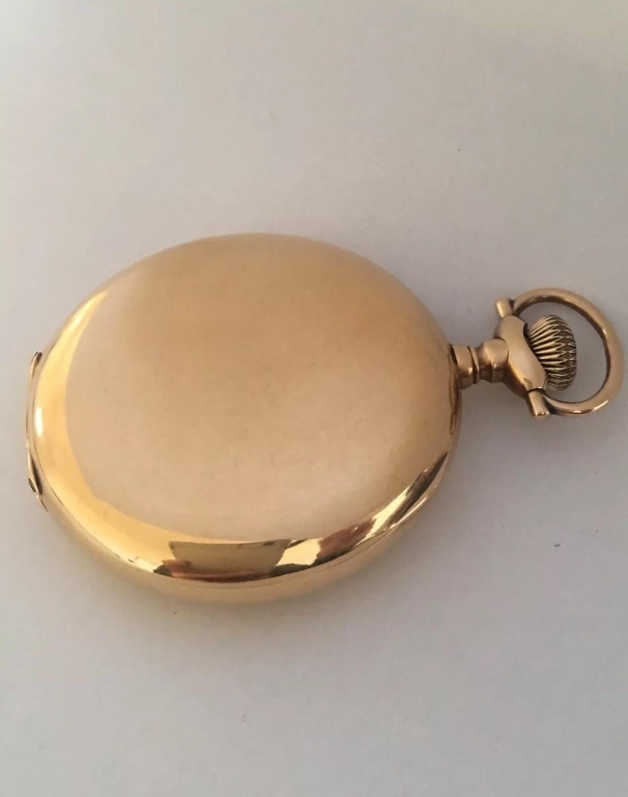 This beautiful antique 50mm diameter enamel dial hand winding pocket watch is in good working condition. And it is running well. Visible signs of ageing and wear with light tiny scratches on the gold watch case. This watch weighed 100 grams . The