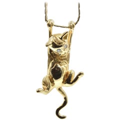 14 Karat Gold “Hang in There” Diamond Cat Pendant on 14 Karat Yellow Gold Chain