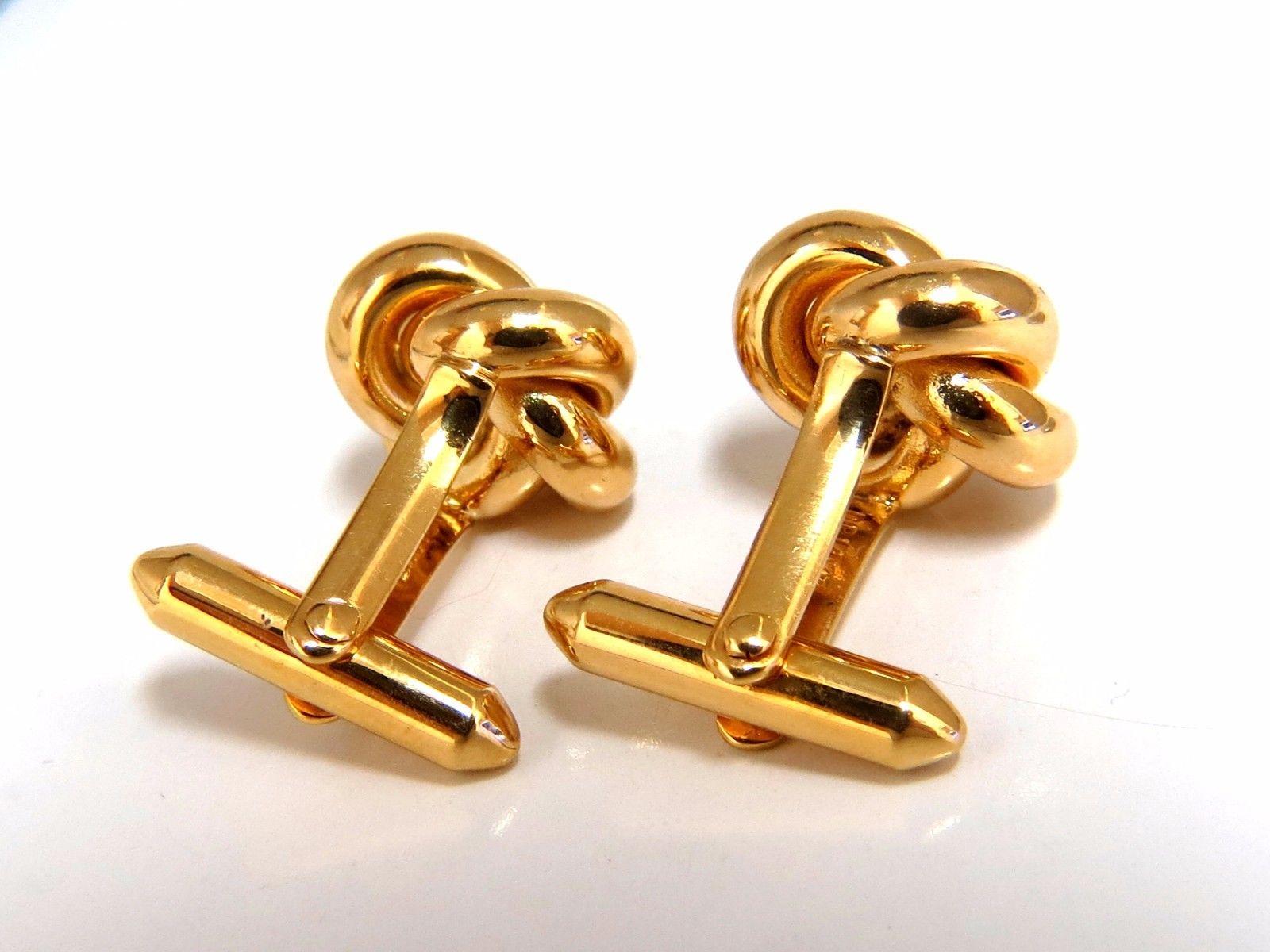 Executive Prime.

Hollow Knot Twist Cufflinks.

Amazing detail / hand crafted

Embossed / Raised 3D  Knot Design

marked 14kt.

9.6 grams.

Top Measures: 13.6mm diamter

Depth: 7.2mm 