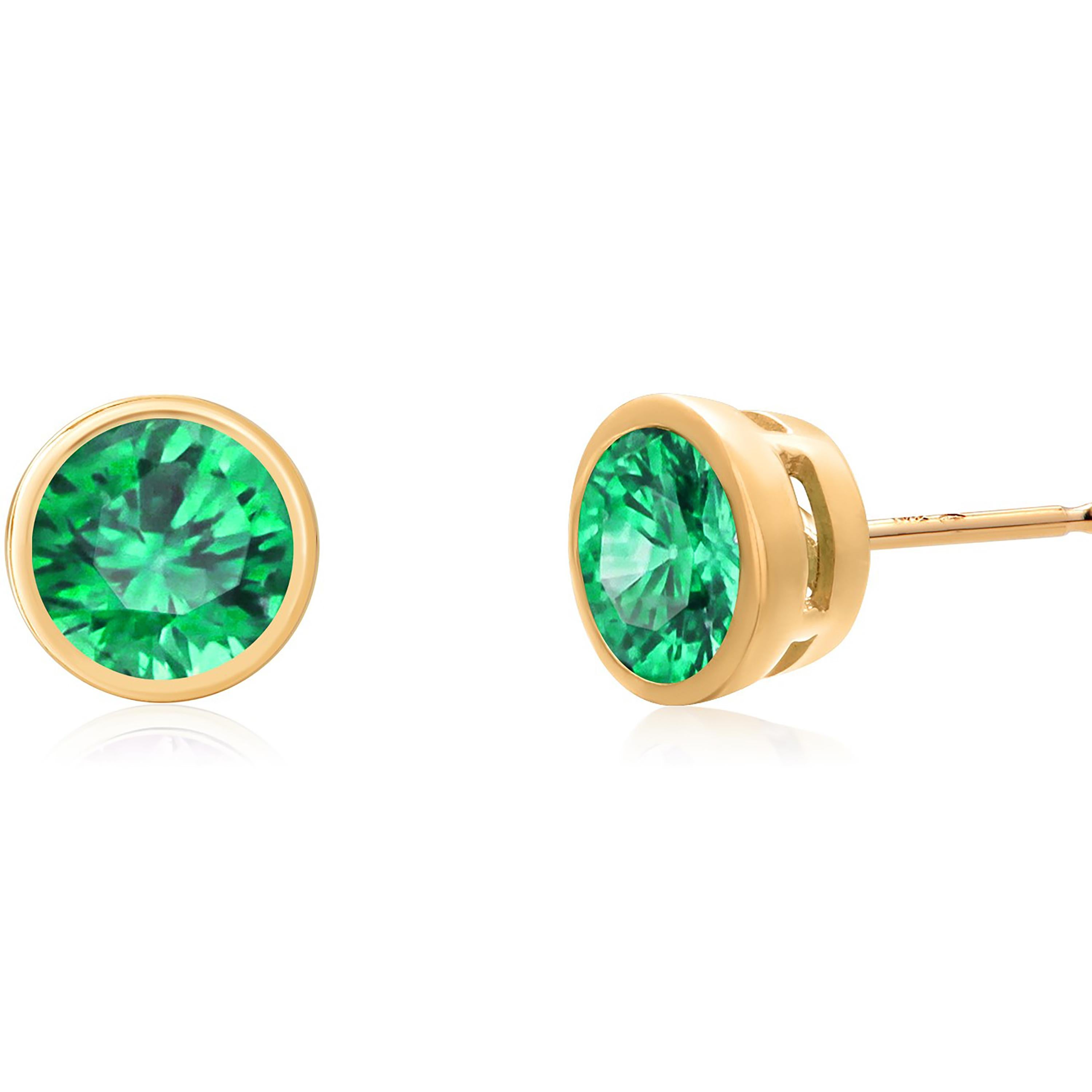 Round Cut 14 Karat Gold Matched Pair Round Emerald 0.65 Carat Stud Earrings 0.20 Inch Wide For Sale