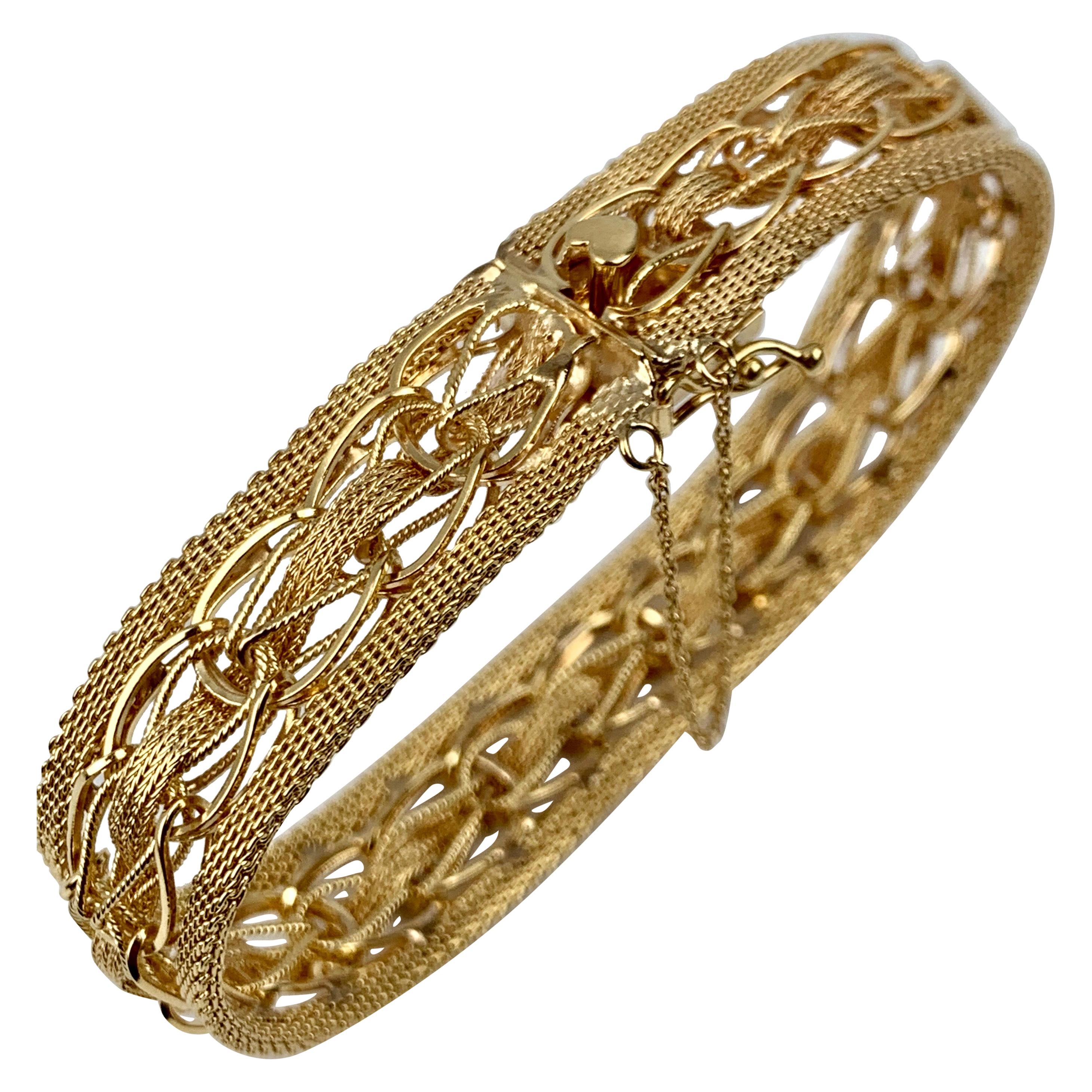 Gold Mesh Bracelet with a Heart Shaped Thumb Latch-14 karat y.g. 