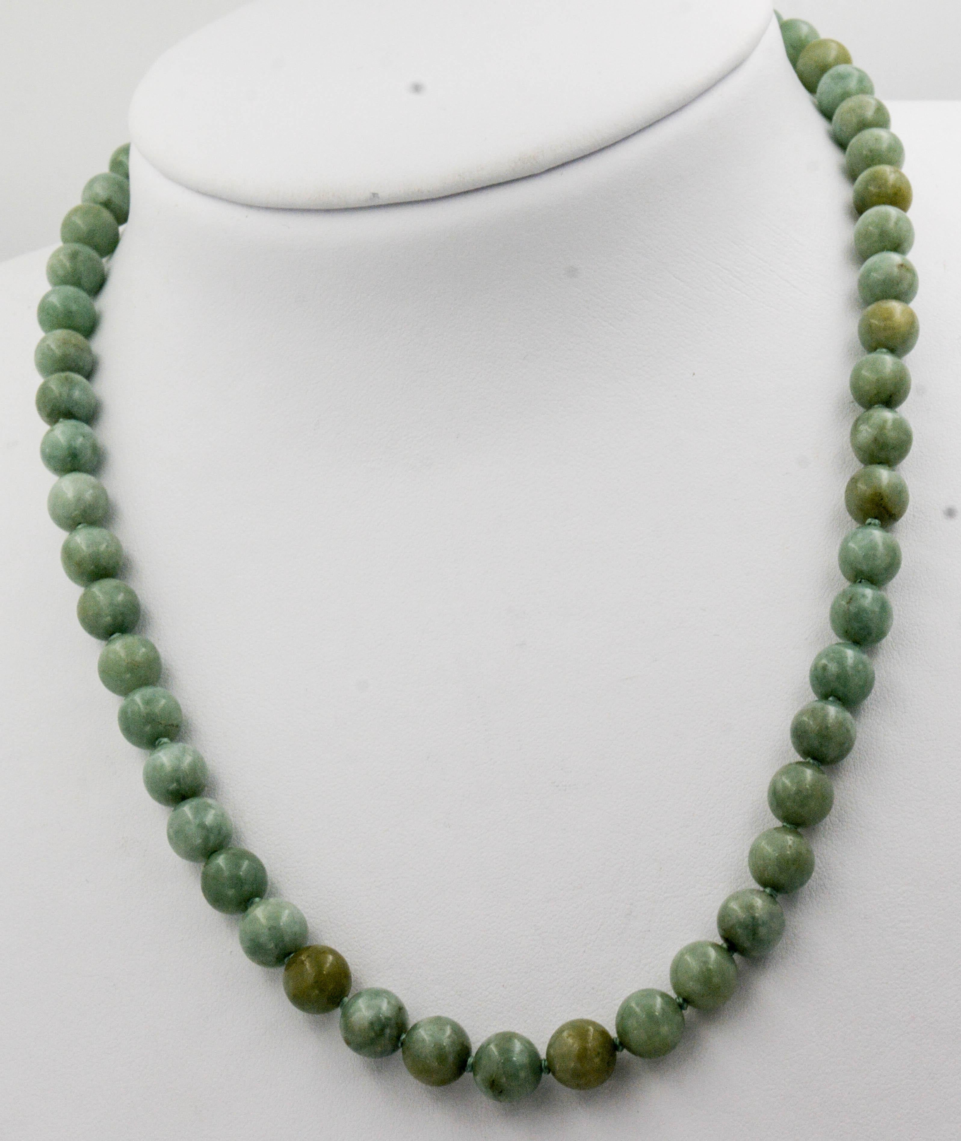 Simply classic styling in soft greens are found in this 20 inche Nephrite Jade bead necklace. This exquisite necklace has 53 Nephrite Jade beads measuring 8.26 mm each, and closes with a 14 karat yellow gold clasp. If you are a fan of Jade, you will