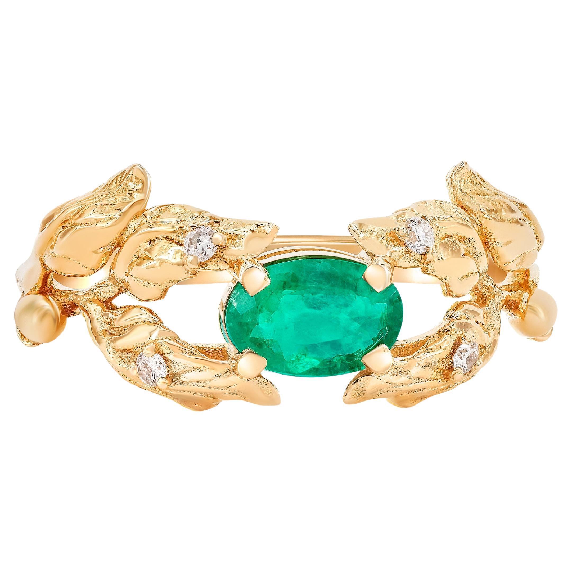 14 Karat Gold Olive Tree Ring with Emerald and Diamonds.