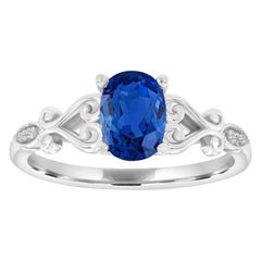 Anillo vintage de oro de 14 quilates con zafiro azul ovalado y diamantes 'Centro-1,48 quilates'