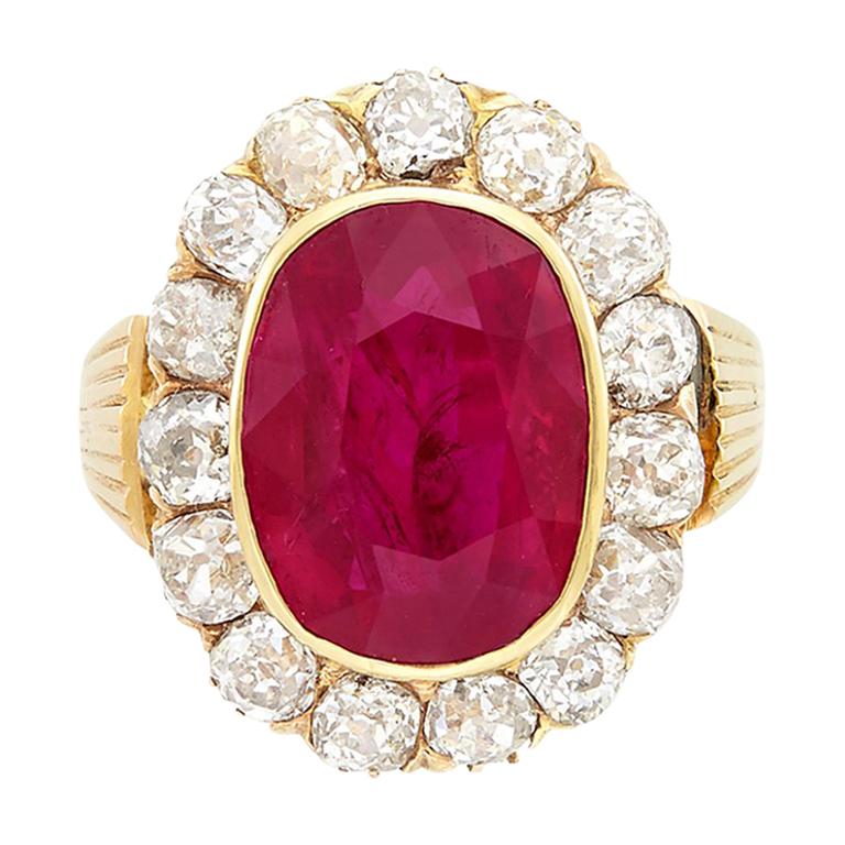 14 Karat Gold, Ring mit ovalem Rubin und Diamant im Angebot