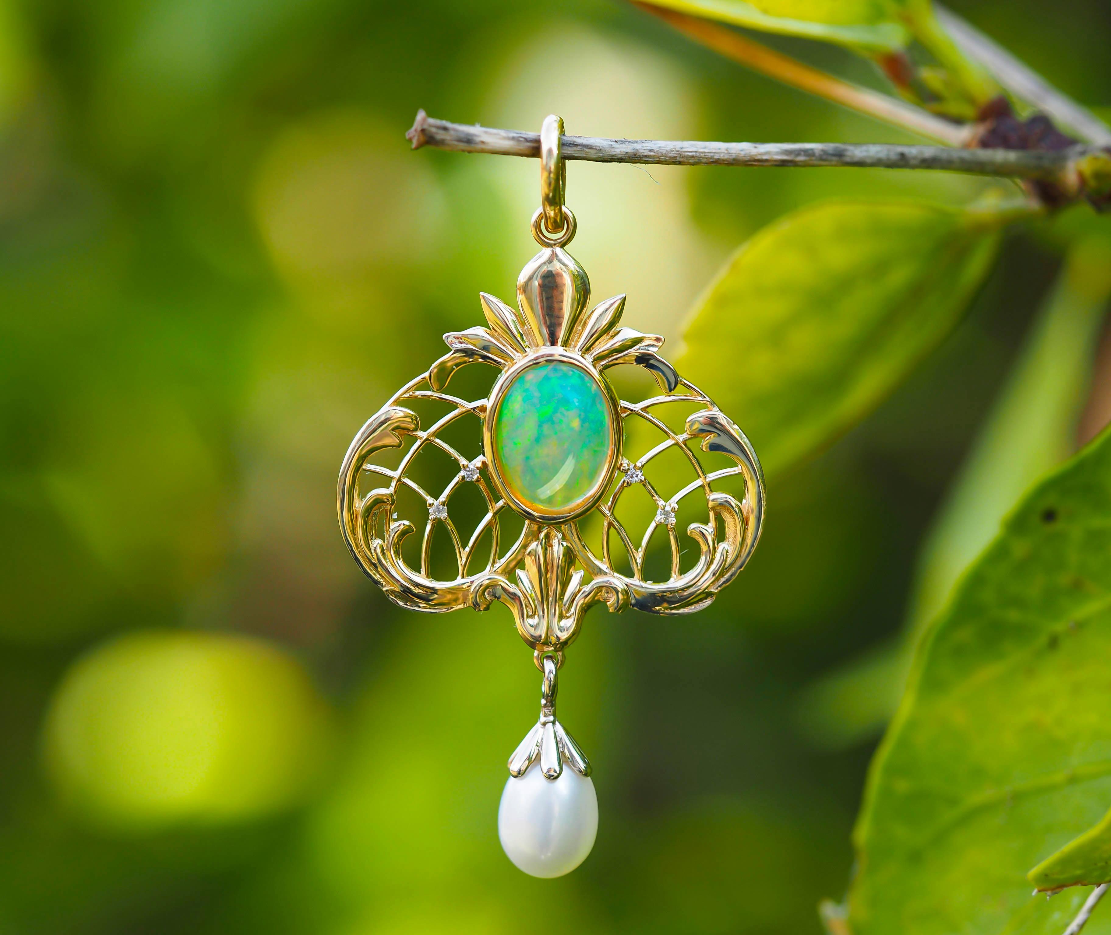 14 karat gold pendant with genuine opal, pearl and diamonds.

Metal: 14k gold
Total weight: 3.35 g.
Size: 42 x 24 mm.

Gemstones (all are tested by professional gemmologist):
1. Genuine opal:
Oval cabochon cut, weight - 1.50 ct, semi-transparent,