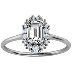 14 Karat Gold, Smaragd-Diamant-Ring mit organischem Halo-Design, Zentrum 1/2 Karat