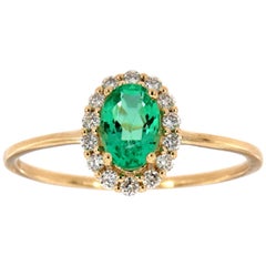 14 Karat Gold Petite Oval Green Emerald Halo Diamond Ring Center, 1/2 Carat
