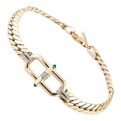 14 Karat Gold, Plain Buckled Wicker Bracelet with Emerald and Diamond details