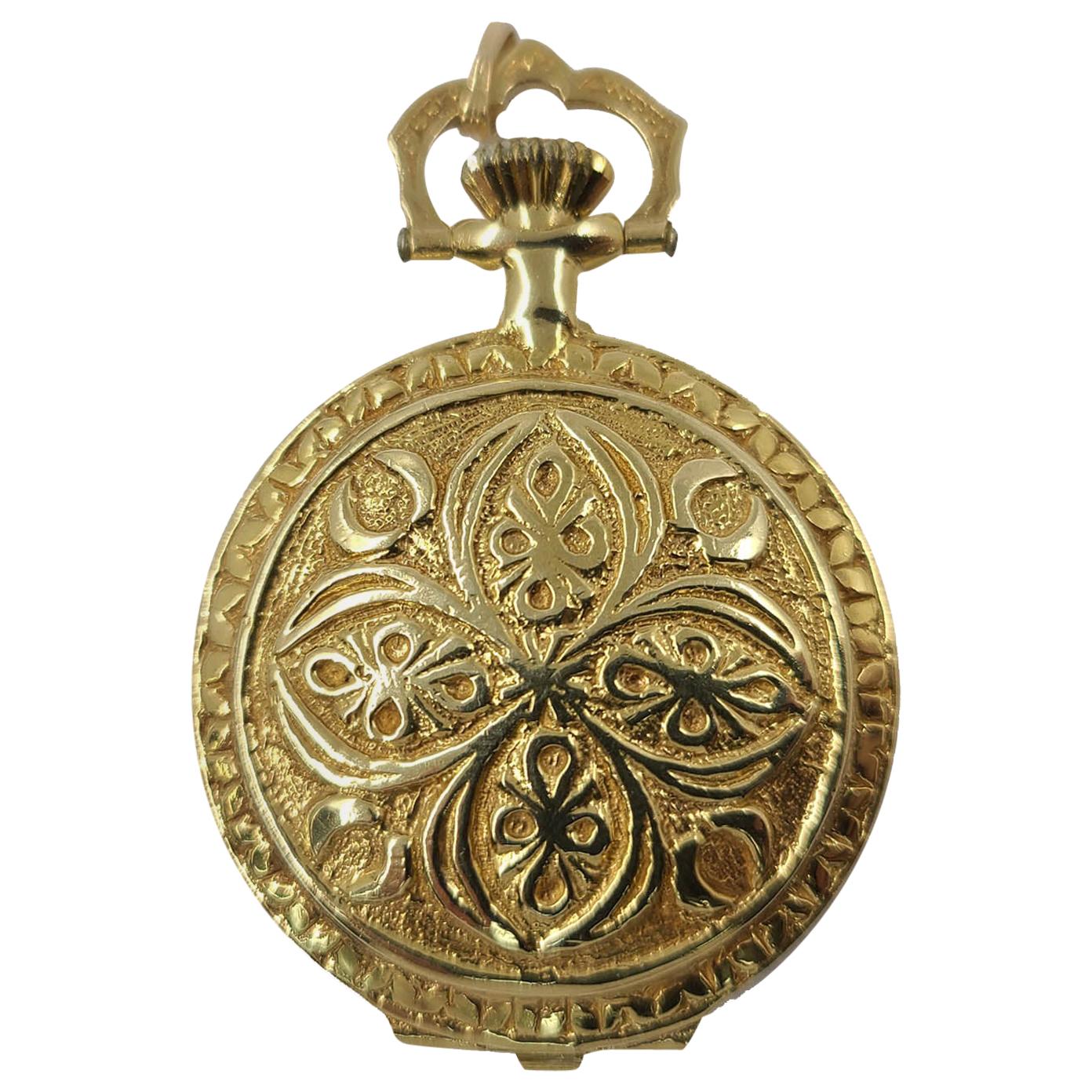 14 Karat Yellow Gold Vega Pocket Watch With Manual Wind Movement. Spring-loaded Hinge Allows For Watch To Pop Up When Opened. The Watch Runs & Keeps Accurate Time. Removable Bale Allows For Wearing As A Necklace Pendant. Finished Weight Is 31.2
