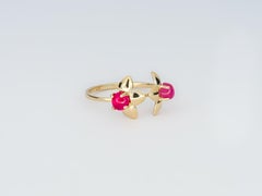 Three petal flower ring with rubies in 14k gold