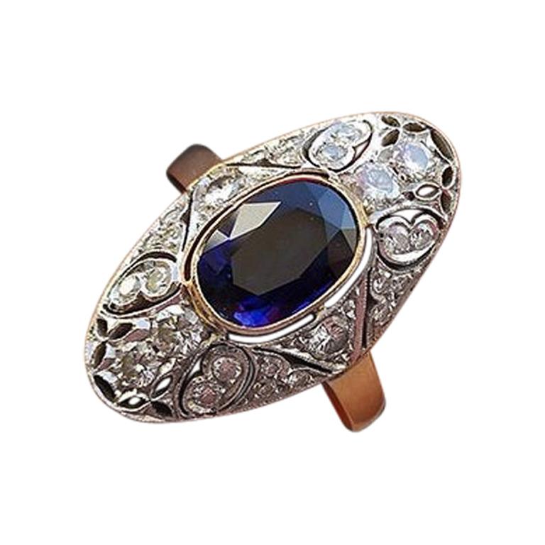 14 Karat Gold Ring with 26 Diamonds and Sapphire