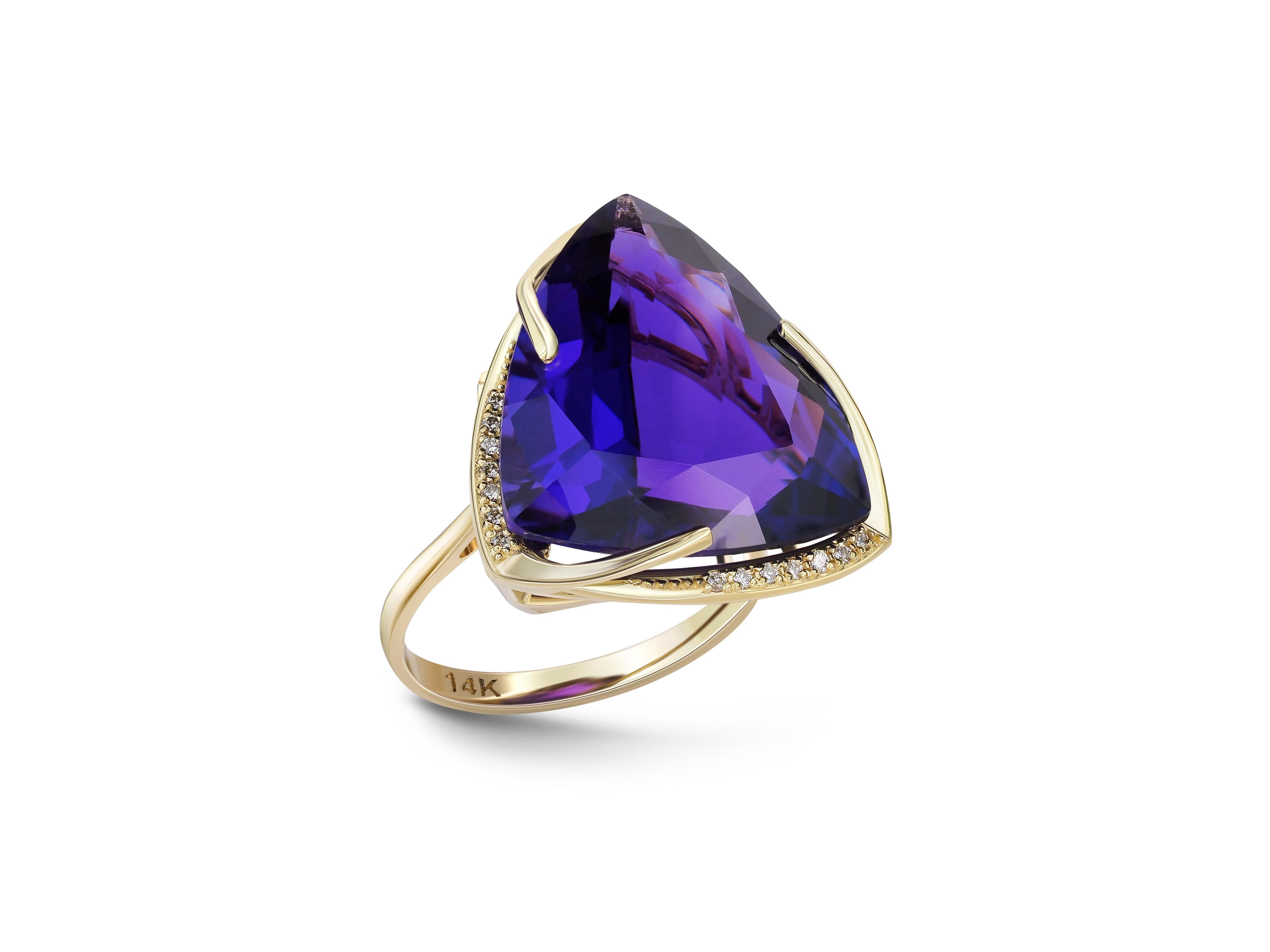 14 karat gold ring with genuine amethyst and diamonds. February birthstone.
Weight: 6.95 g.
Central stone: Genuine amethyst
Weight: 19.00 ct (19 x 19 x 17 mm)
Trillone cut, color - intence violet
Clarity: Transparent with inclusions
Surrounding