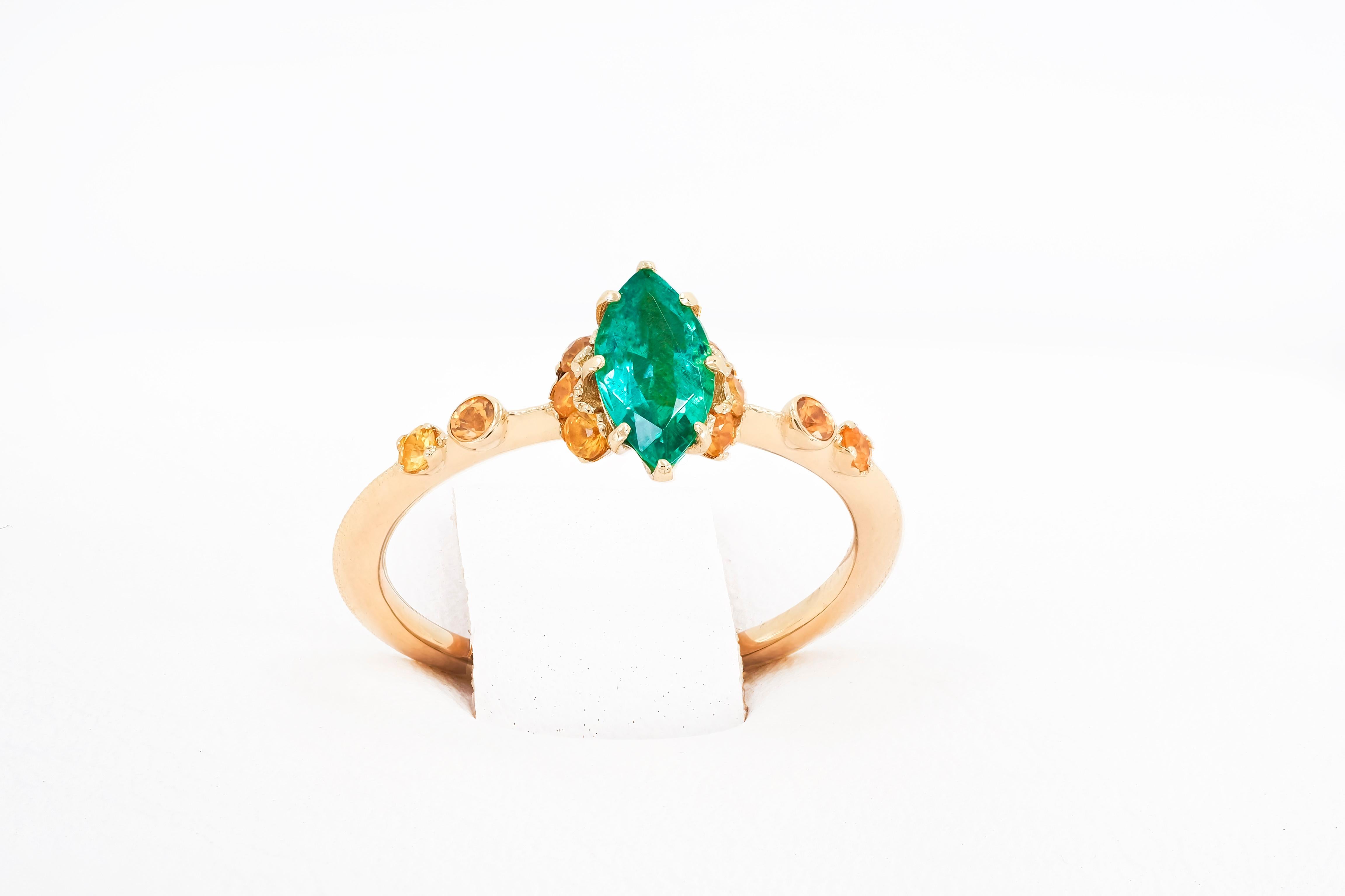 Marquise Cut 14 Karat Gold Ring with Emerald and Sapphires For Sale
