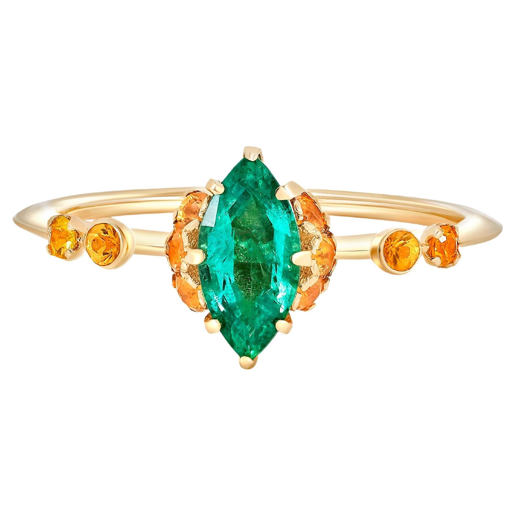 14 Karat Gold Ring with Emerald and Sapphires