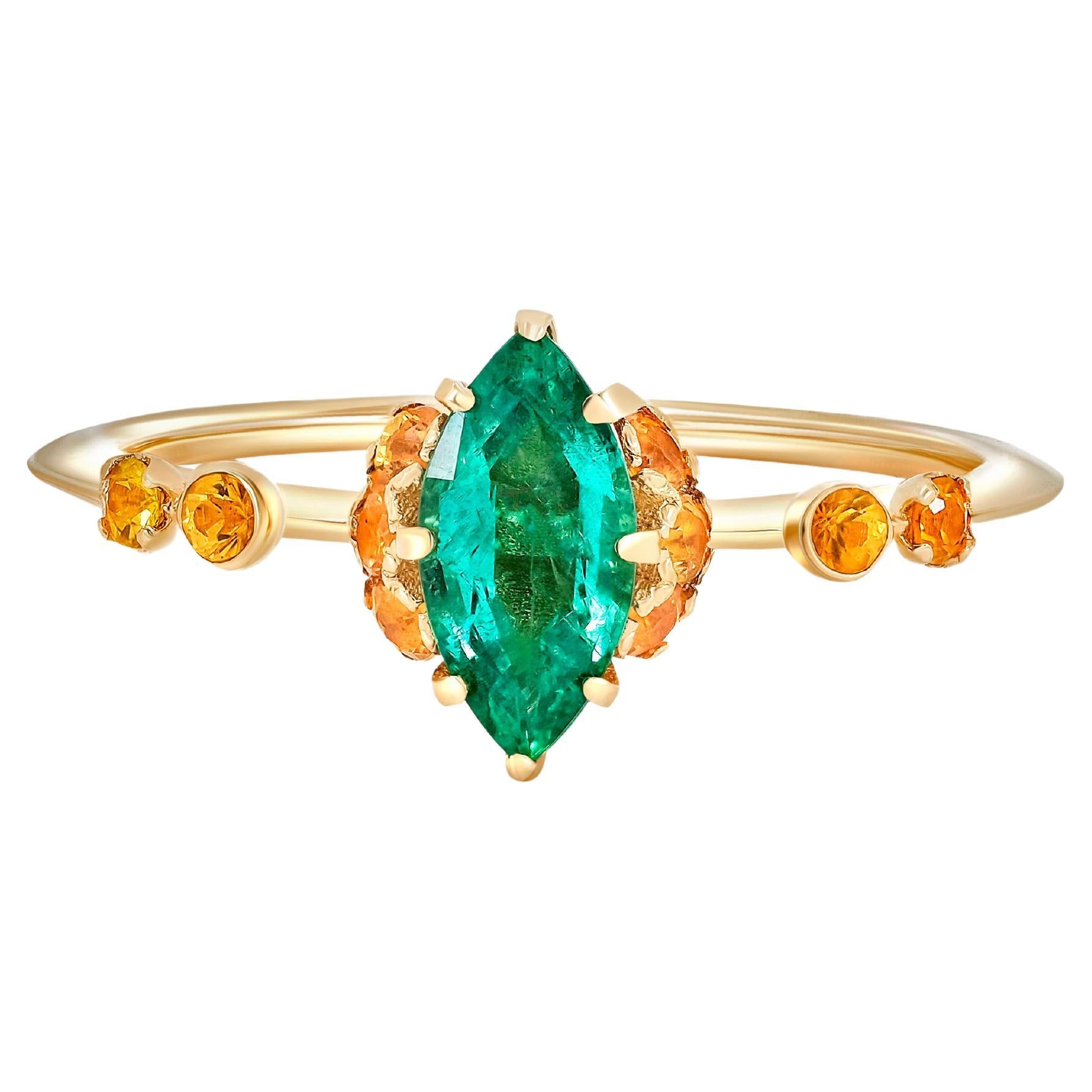 14 Karat Gold Ring with Emerald and Sapphires For Sale