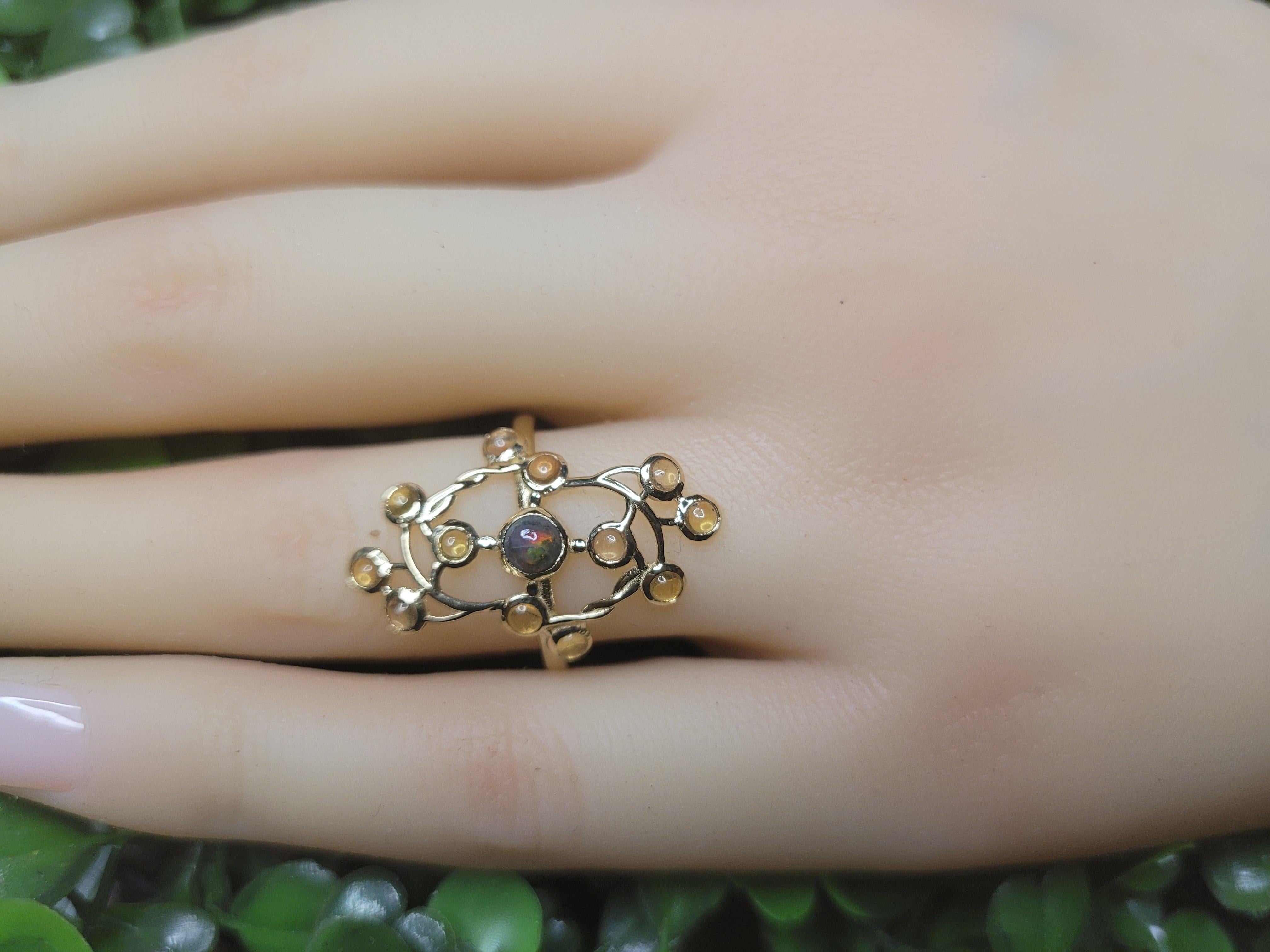 14 Karat Gold Ring with Opal and Sapphires 12
