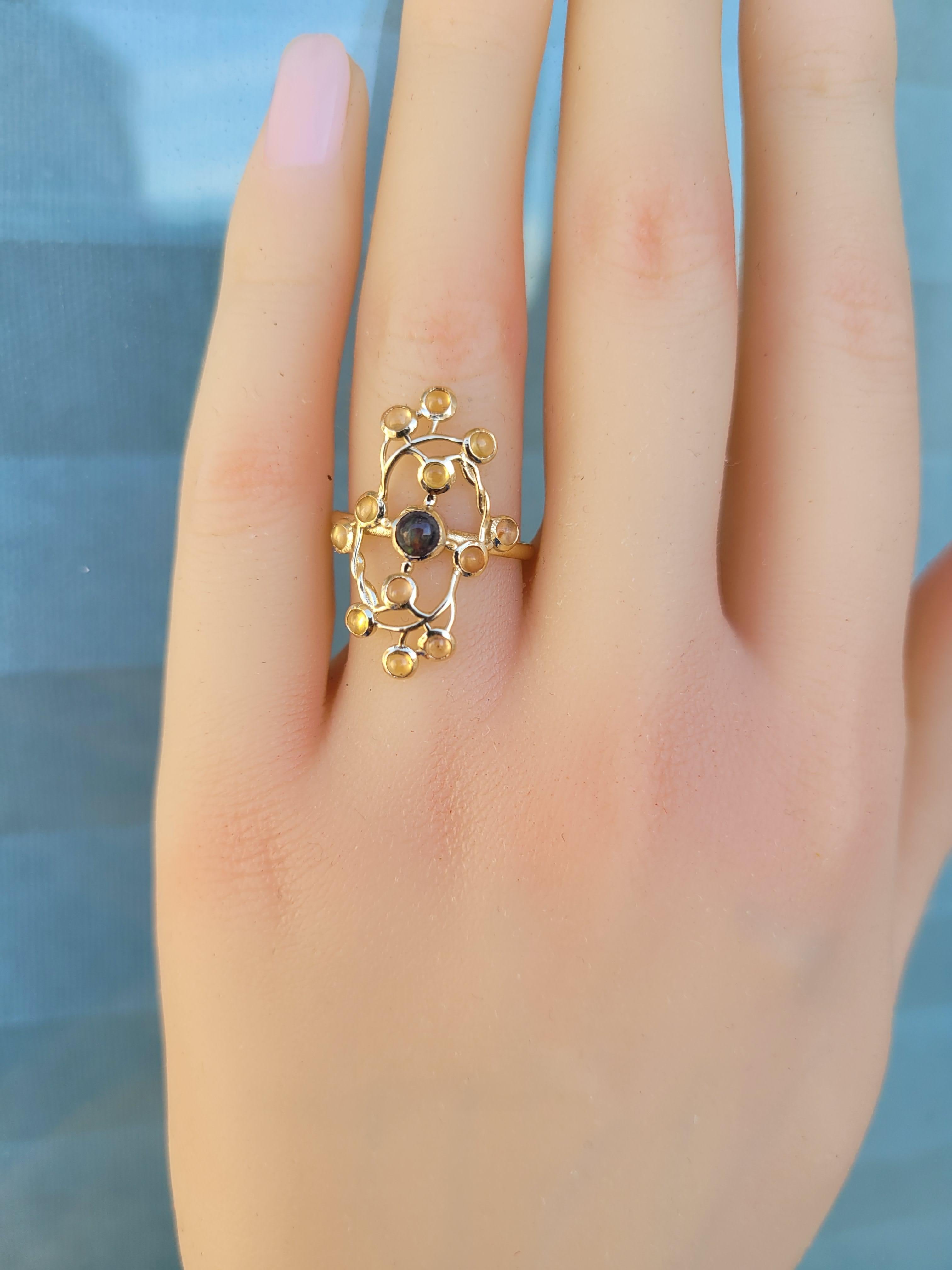 14 Karat Gold Ring with Opal and Sapphires 13
