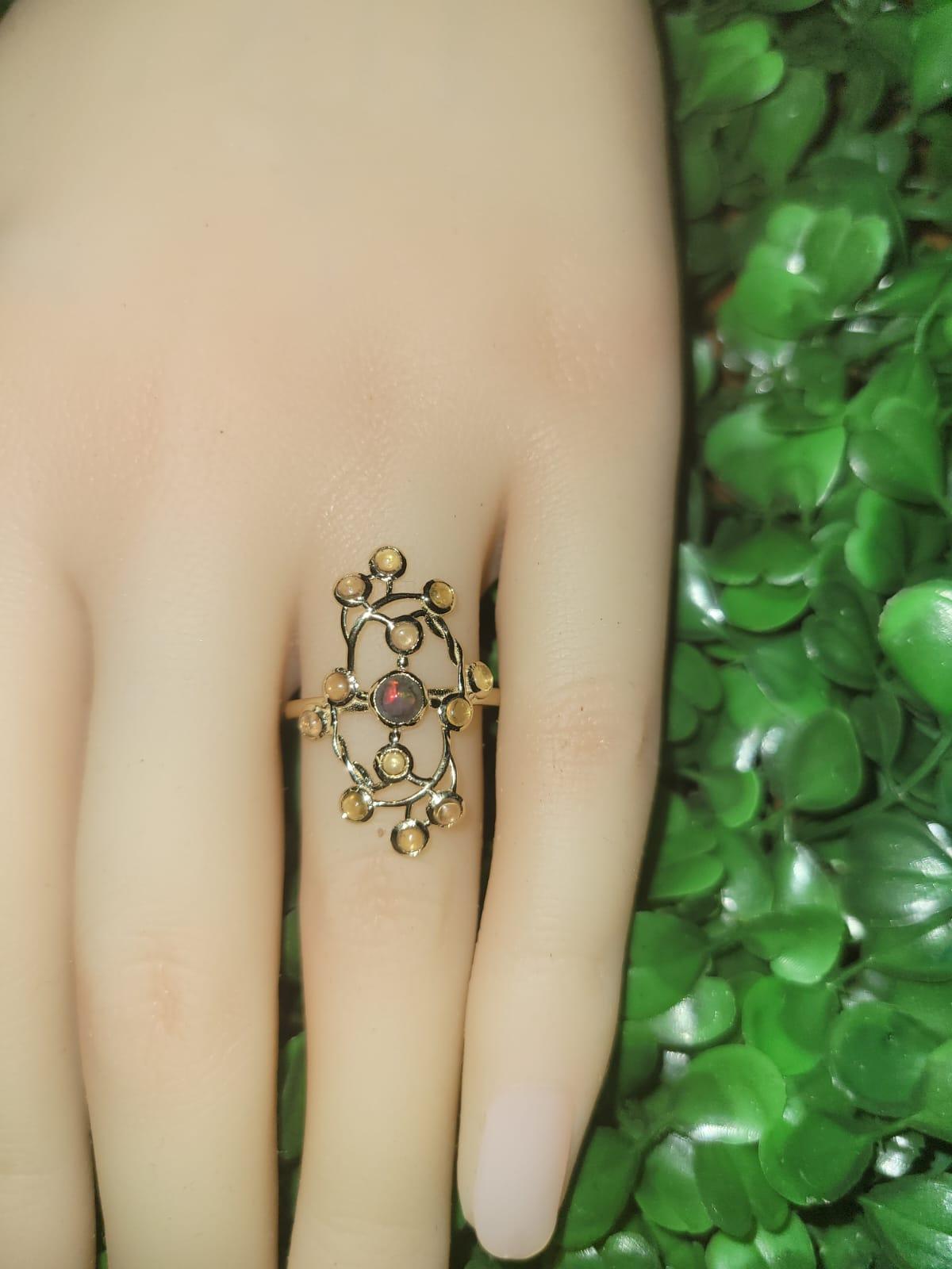 14 Karat Gold Ring with Opal and Sapphires 14