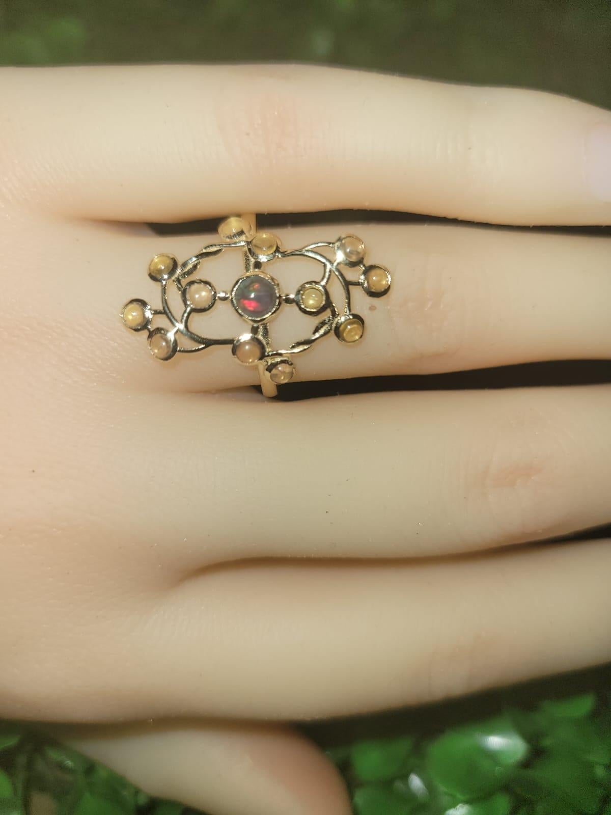 14 Karat Gold Ring with Opal and Sapphires 15