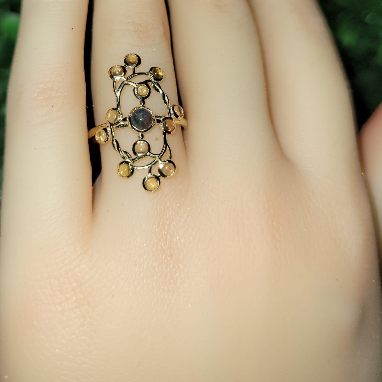 14 Karat Gold Ring with Opal and Sapphires 7
