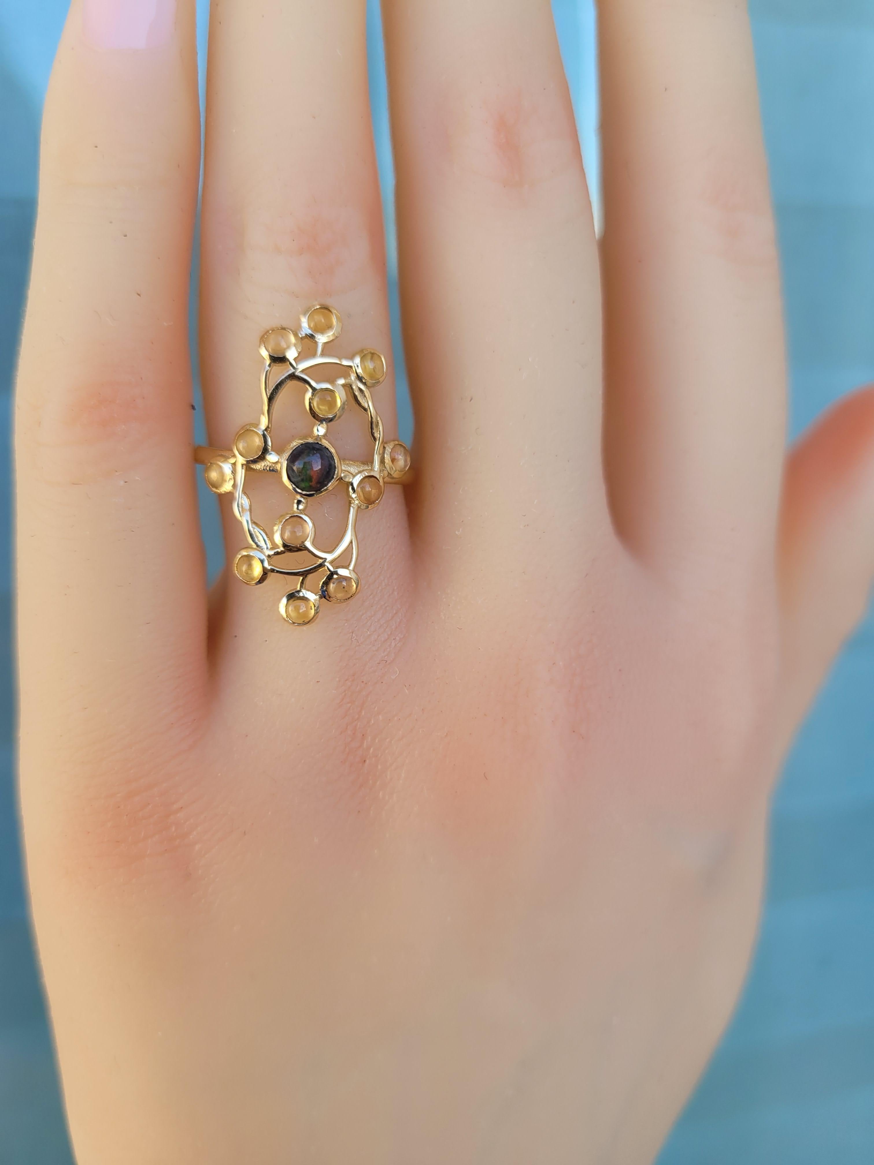 14 Karat Gold Ring with Opal and Sapphires 10