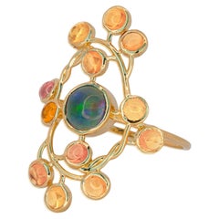 14 Karat Gold Ring with Opal and Sapphires